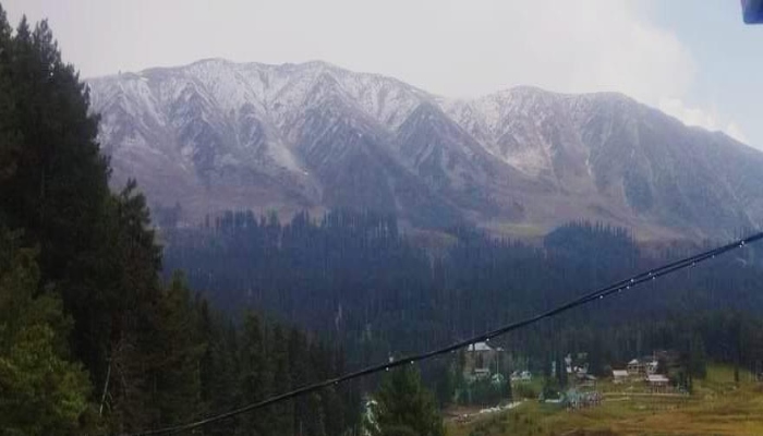 Gulmarg's Affarwat mountain receive seasons first snowfall 2023